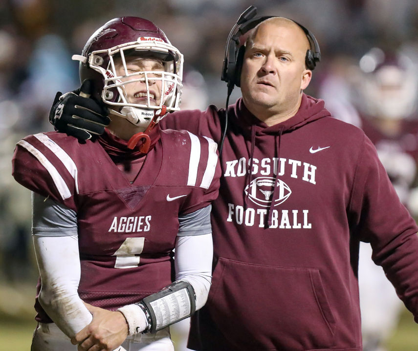 Coach consoles QB after injury